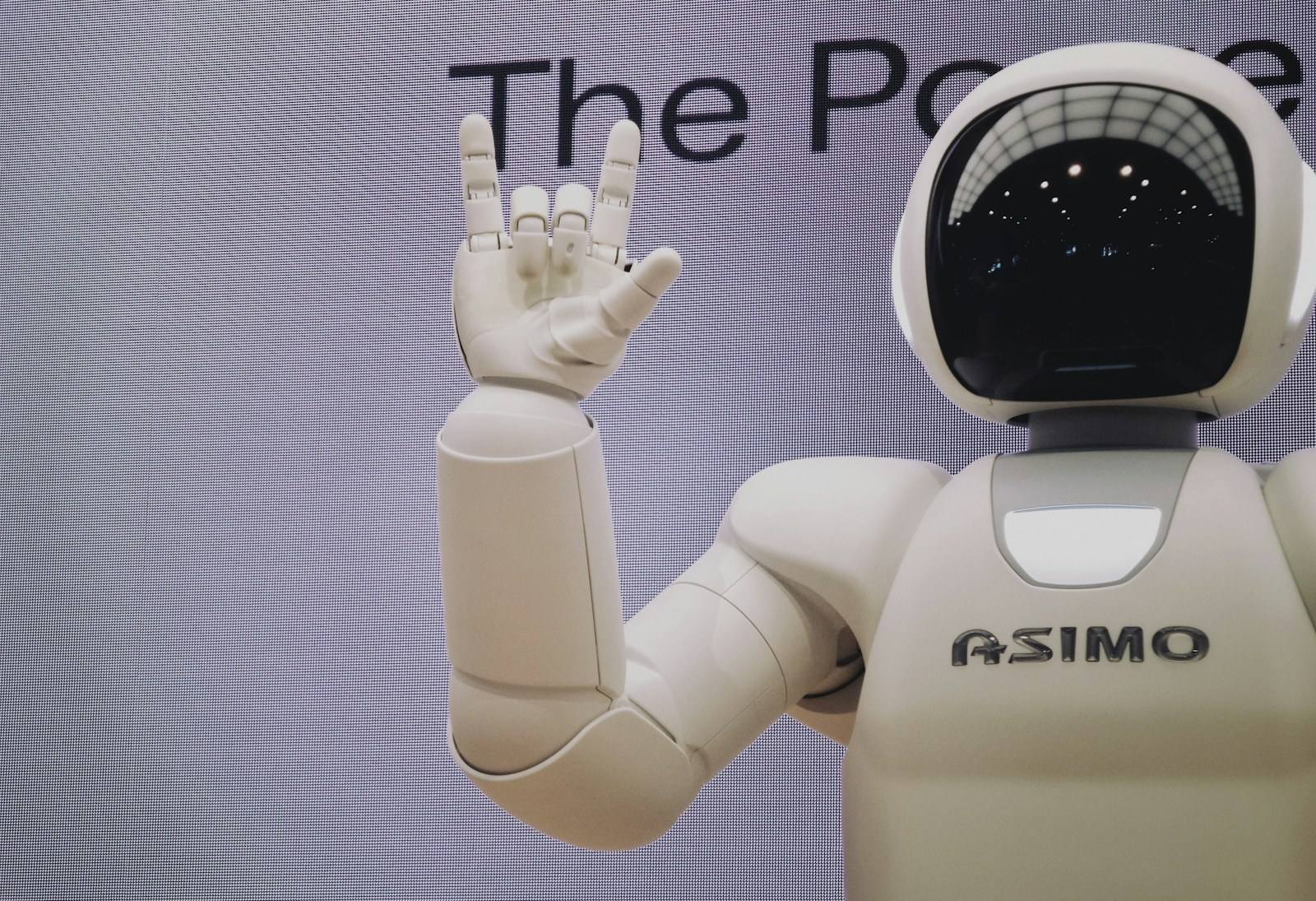 A humanoid robot silhouette representing AI-driven analytical services