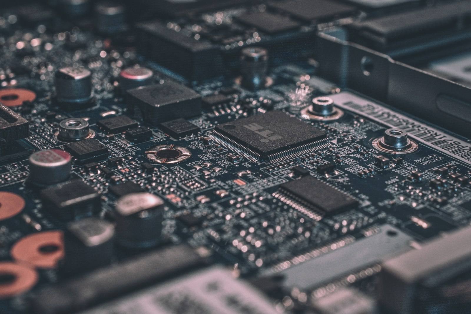 A close-up of a circuit board representing technical integration and infrastructure