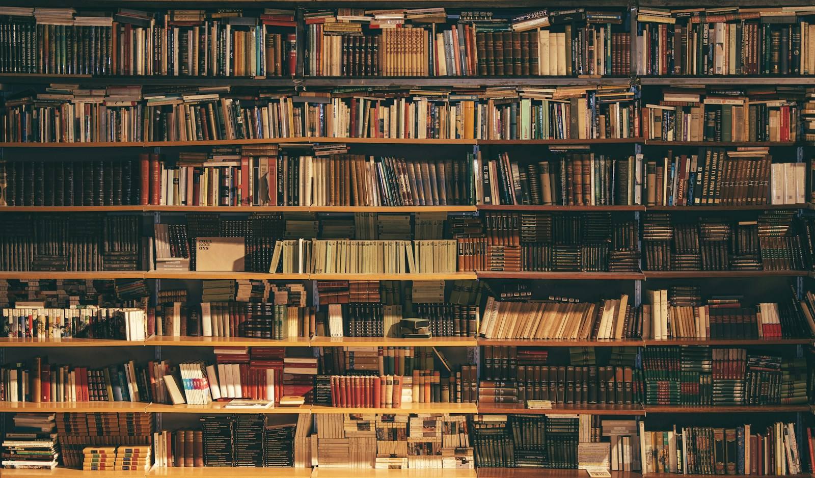 A grand library reading room representing research and academic collaboration